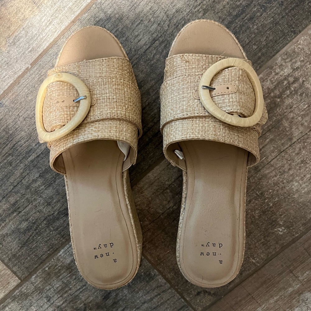 Tan and black sandals